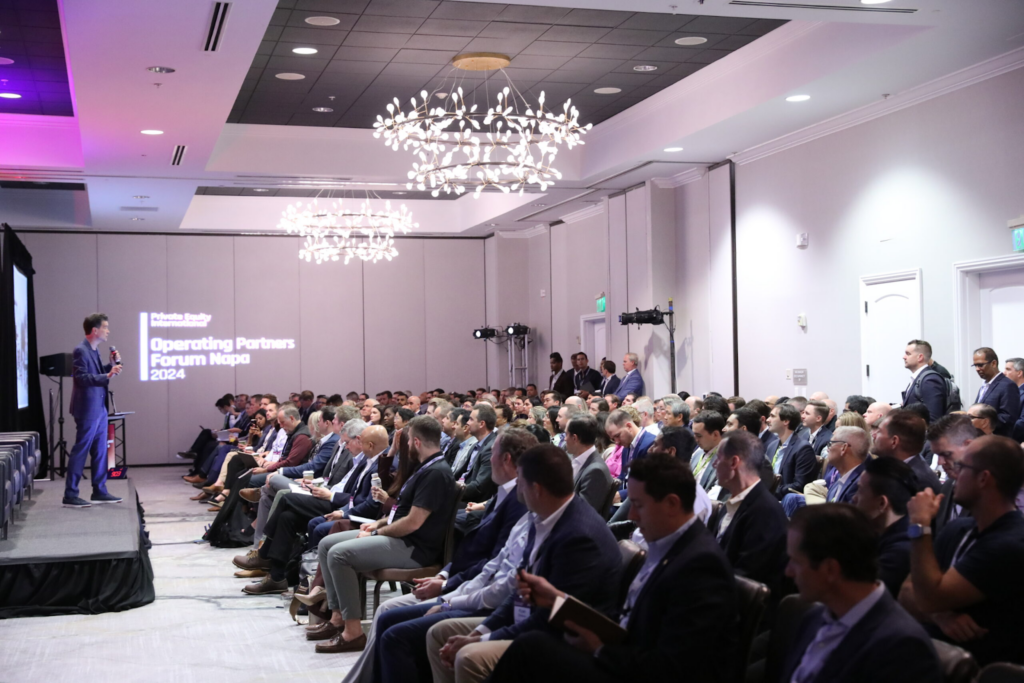 A keynote presentation with a full audience at the PEI Operating Partners Forum