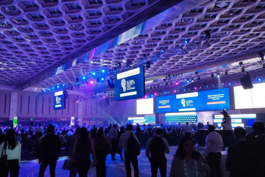 Attendees gathered inside a large keynote hall at Global Fintech Fest