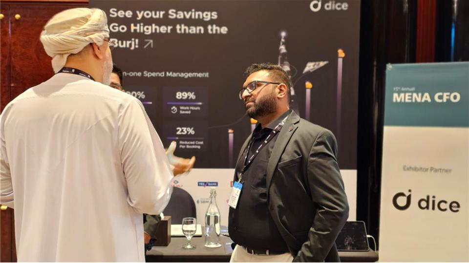 Attendees networking with exhibitors at the MENA CFO Summit